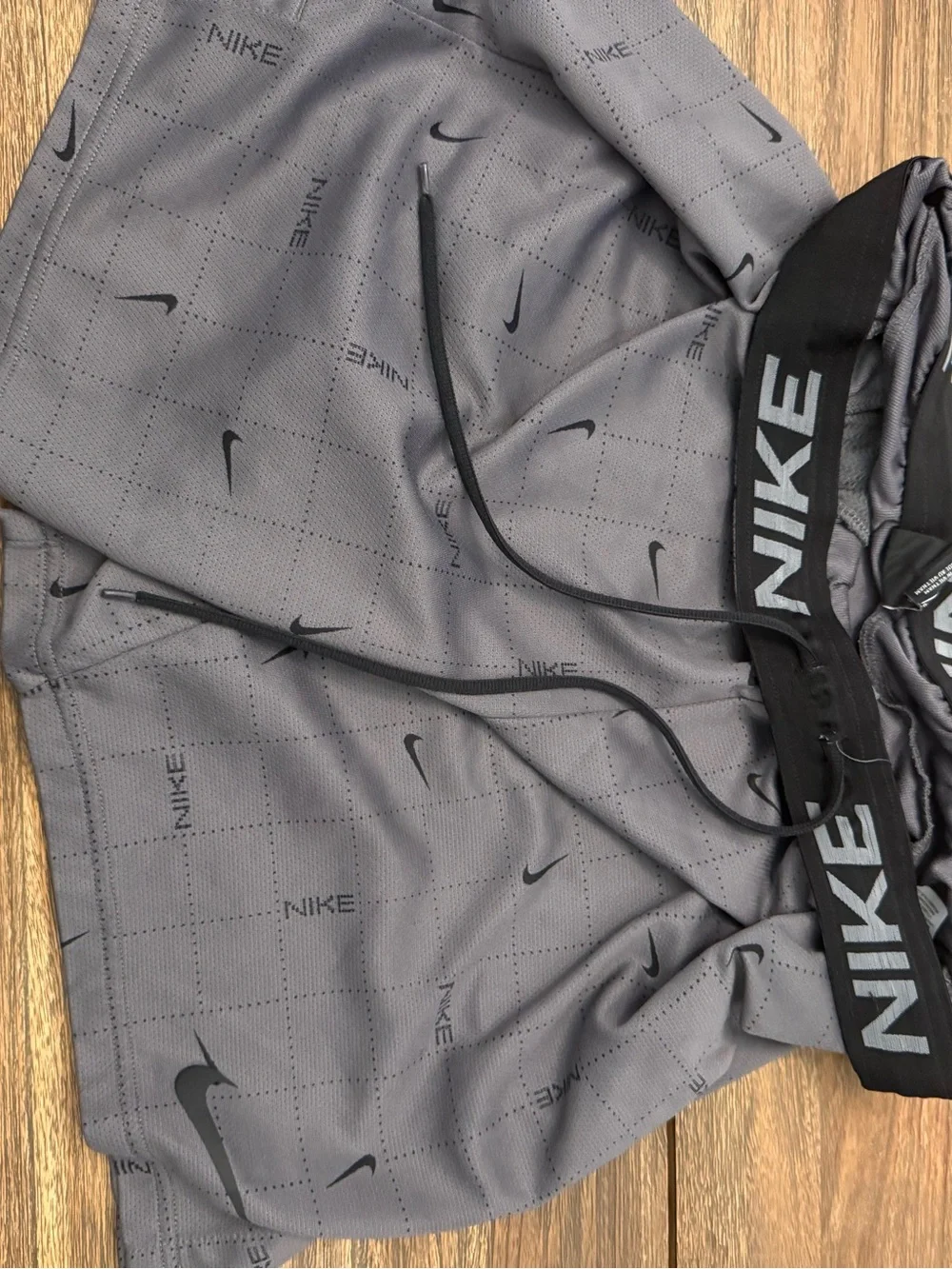 Nike Grey Performance Athletic Shorts with Subtle Swoosh Print